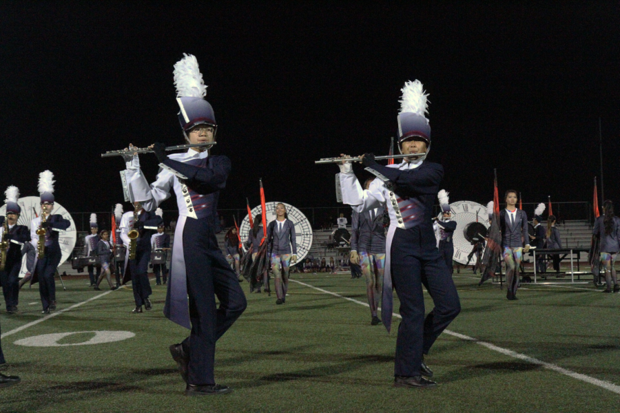 Marching band and colorguard keep up the pace