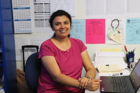 Math teacher Anshul Agrawal sits in her classroom after school.