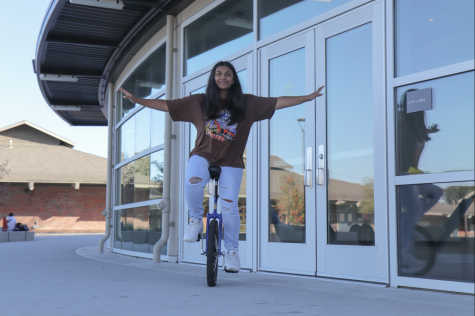 Reintroducing herself to the art of unicycling, Medha Belwadi balances on one wheel.