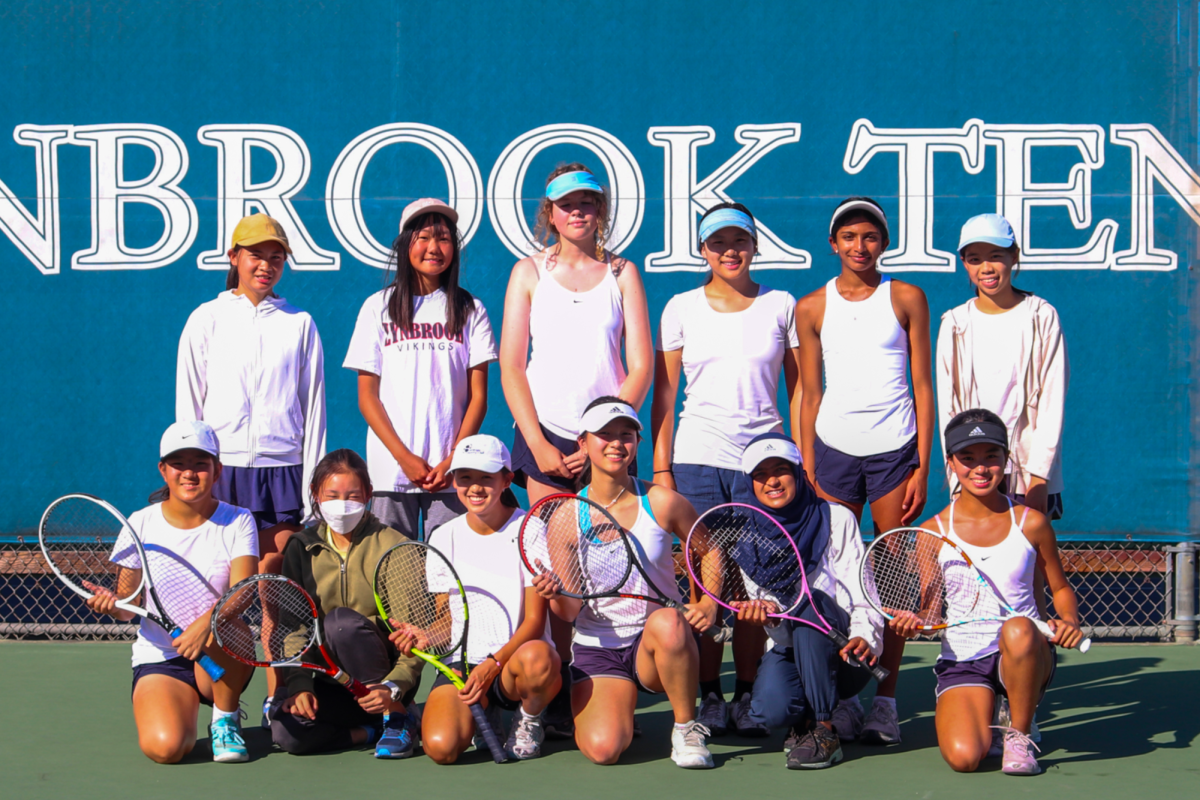 The JV girls tennis team is still looking for a coach. Norman Tsai has taken on the role of coaching both the JV and varsity girls tennis teams.