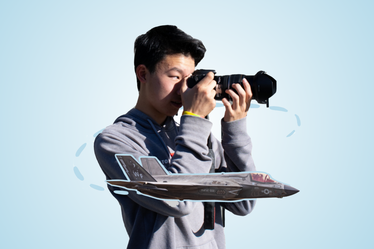 Sophomore Ethan Wong strategically positions himself before clicking his camera to capture the Lockheed Martin F-35C as it flies by.