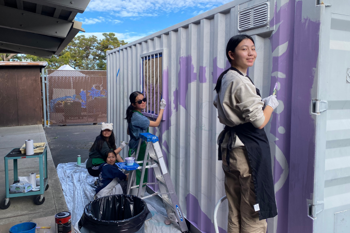 Public Art Club officers and members work on their mural on Jan. 21. Photo used with permission from Judy Schulze.