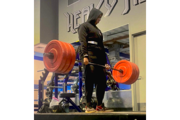 Senior Aakash Ozarker steadily deadlifts in the gym. Used with permission from Aakash Ozarker.