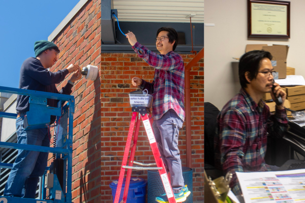 Allen Chan and Toan Phuong work hard to replace security cameras and pick up calls.