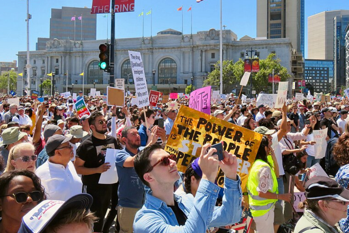 Californians rally in protest against Trump's immigration policies at the San Francisco Civic Center. Image used with permission by Wikimedia Commons.