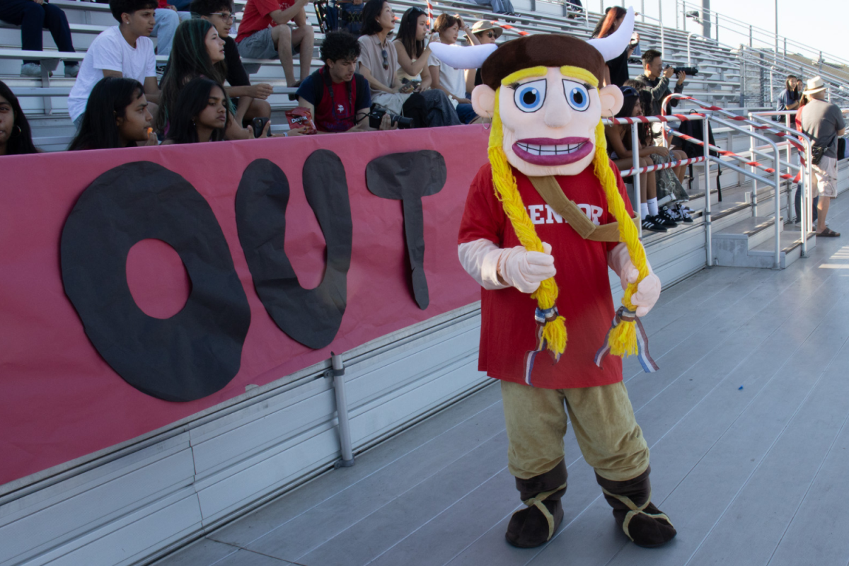 Vicky the Viking strikes a pose at the first student section of the 2025-26 school year, themed "Red Out."