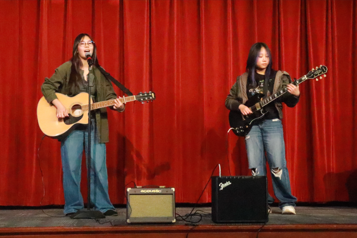 Performances of from members of Magic Club, Stand-Up Comedy, Guitar Club and other students create a light atmosphere at the Cupertino Community Hall.